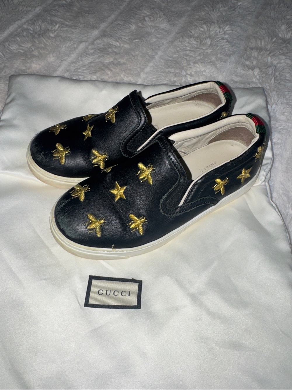 Gucci Kids Black Leather Slip-On Sneakers with Gold Embroidered Stars and Bees